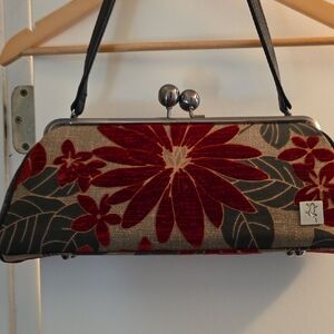 Elegant Red Floral Clutch with Black Accents